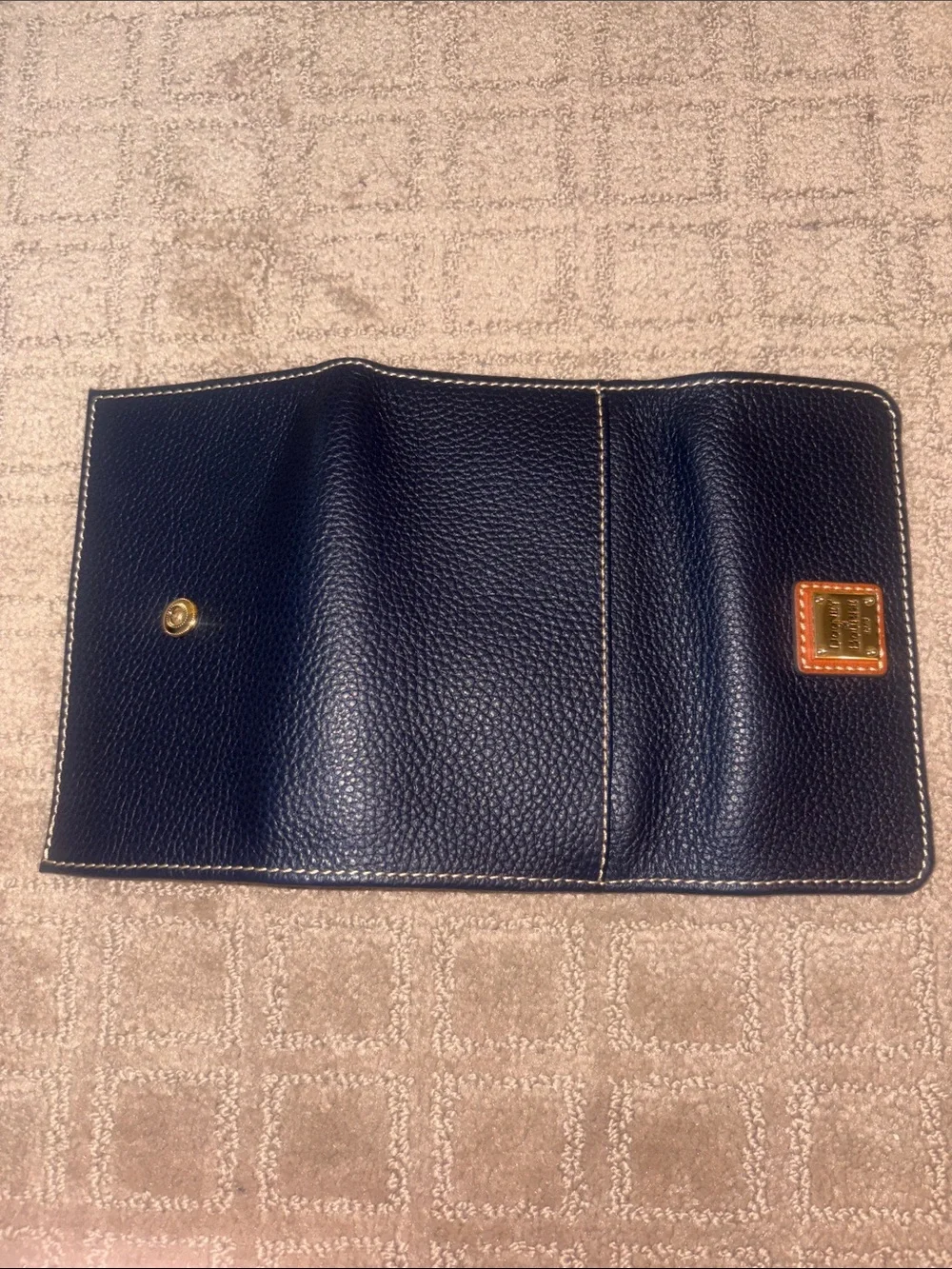 Dooney & Bourke Black Pebbled Leather Flap wallet